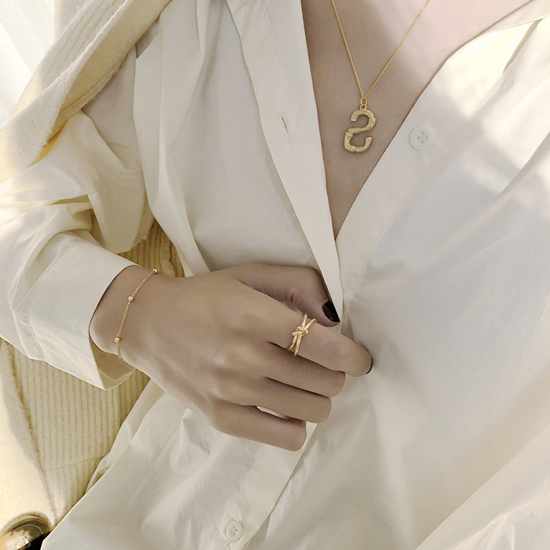 SAND Jewelry 14k gold simlple knotted ring
